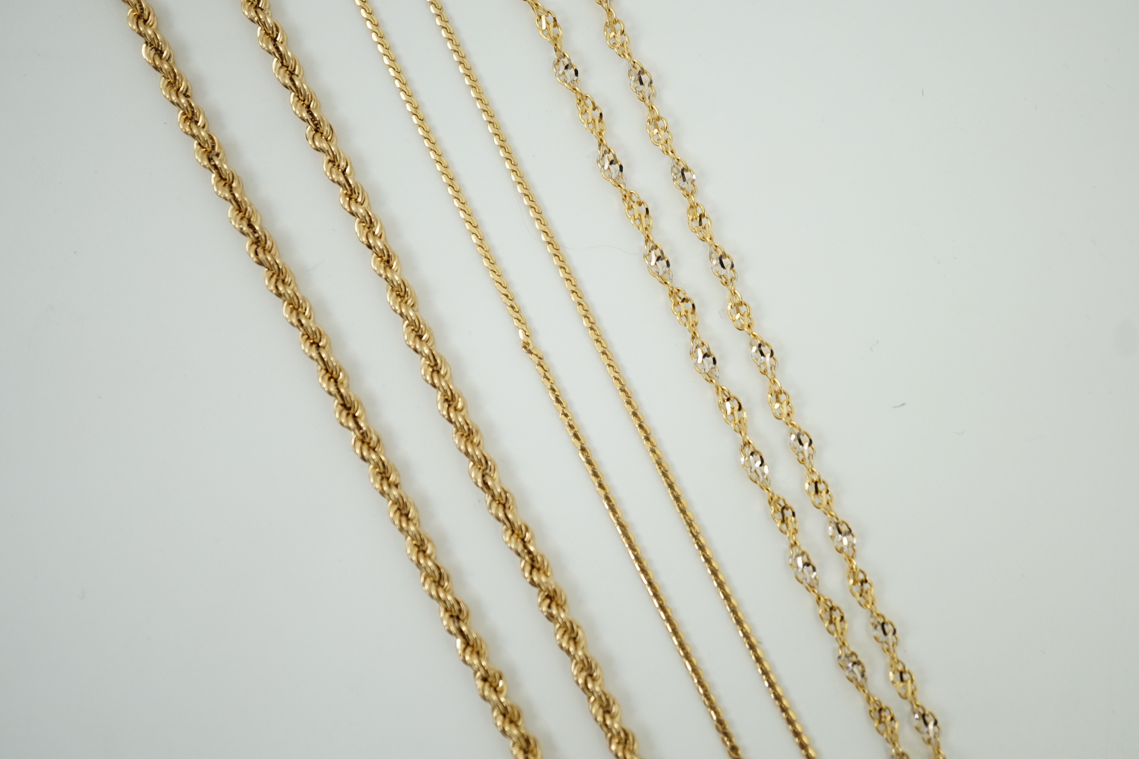 Four assorted modern 9ct gold chains, including rope twist, 39cm, 12.7 grams.
